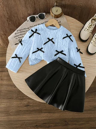 Girls' Fashion Two-Piece Set – Cute Bow Cutout Round Neck Long-Sleeve Knit Top + Versatile Black PU Mini Skirt